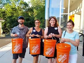 Educators leaving the 2022 dinner symposium with their mosquito supplies