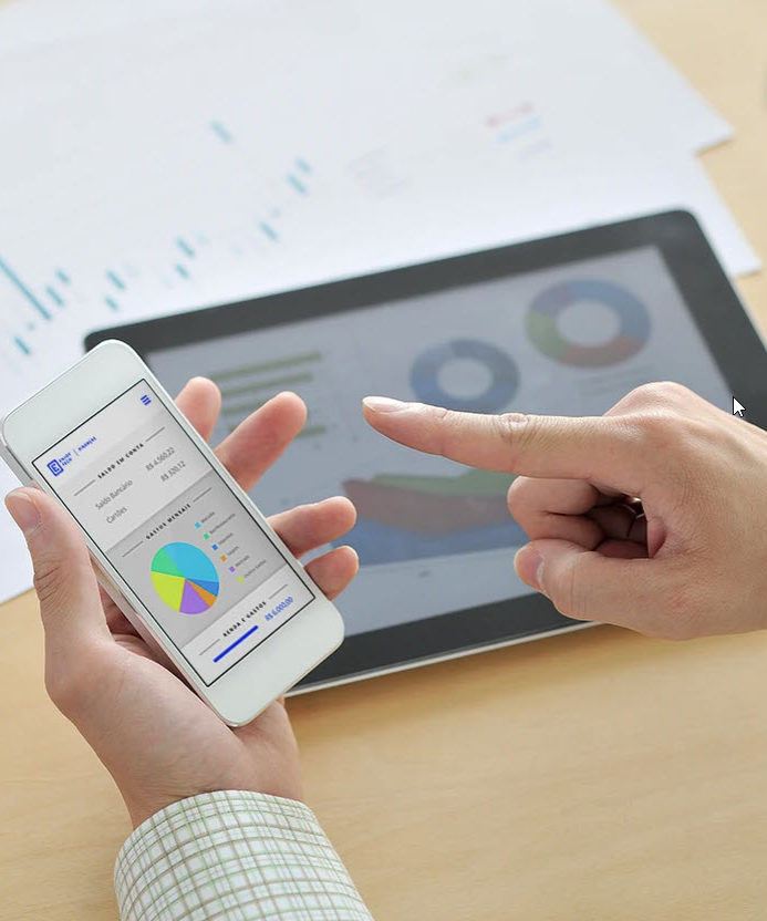 Student holding iphone with a PowerPoint open 