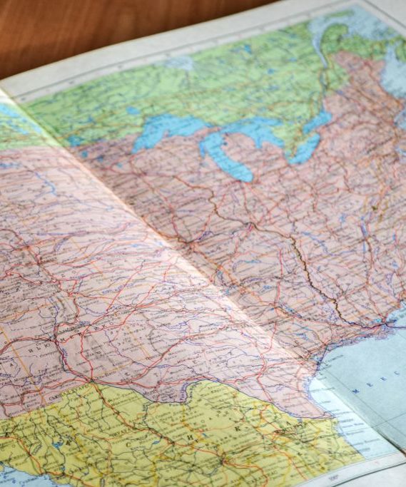 Road Atlas opened to show map of the United States 