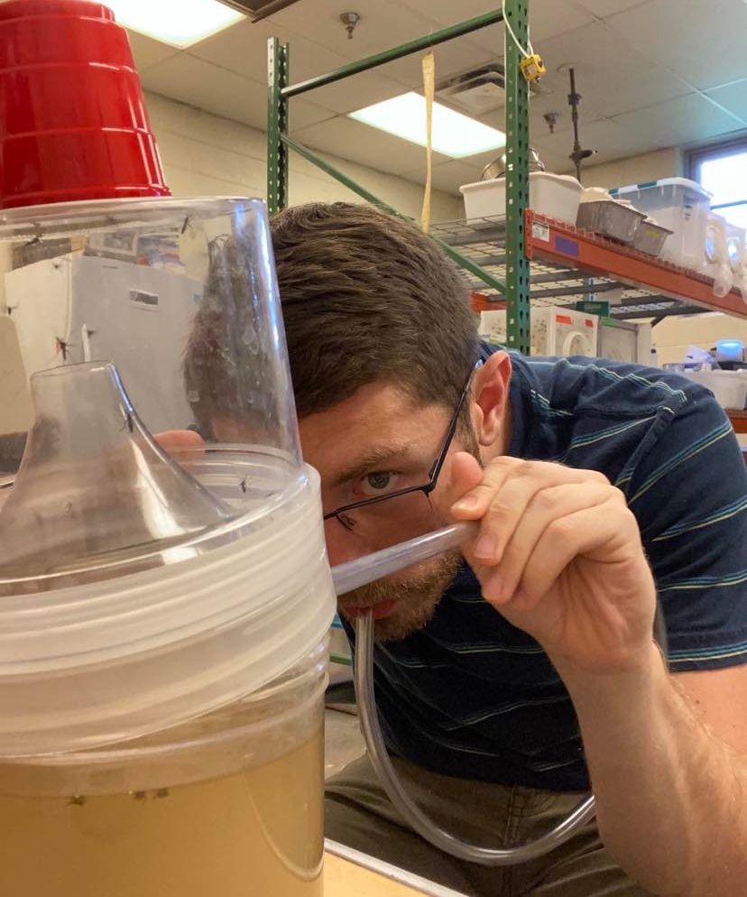 student conducting breathing exercise in mosquito experiment 